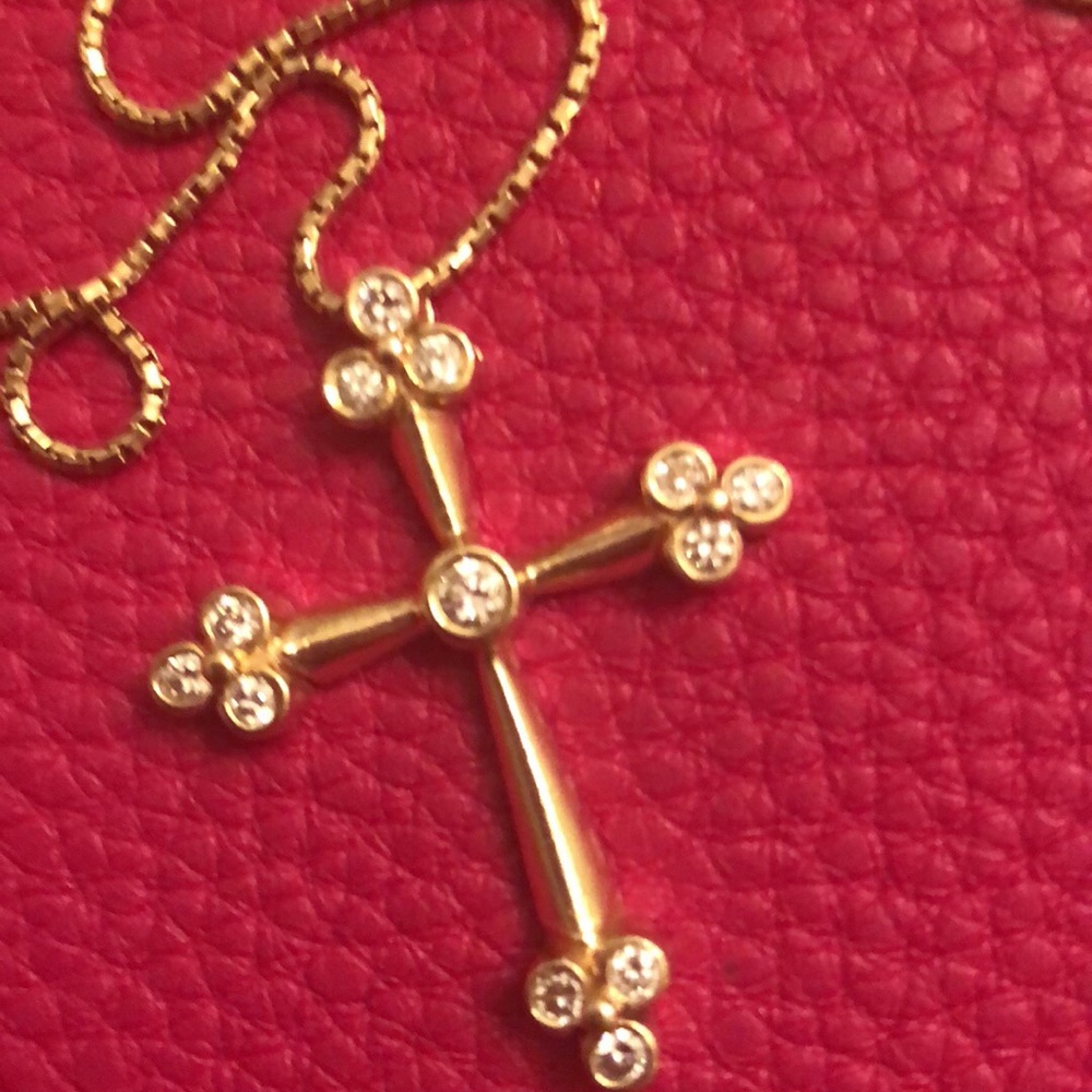 Gold cross pendant